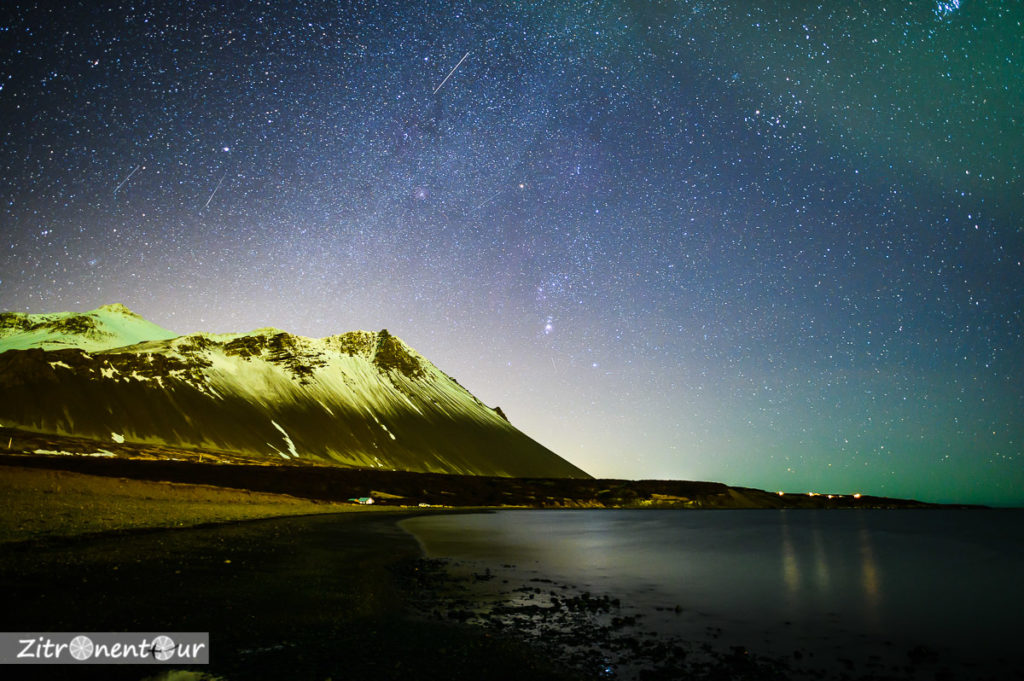 Polarlicht über Hafnarfjall und Sternbild Orion